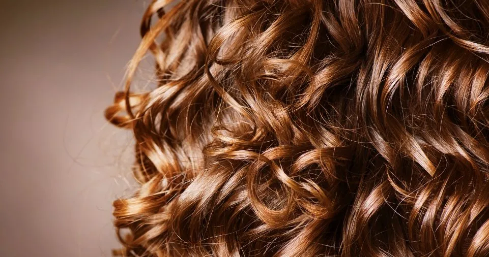 The Best Way to Sleep to Protect Your Curly Hair